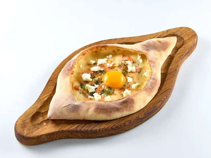 Adjarian khachapuri with salmon