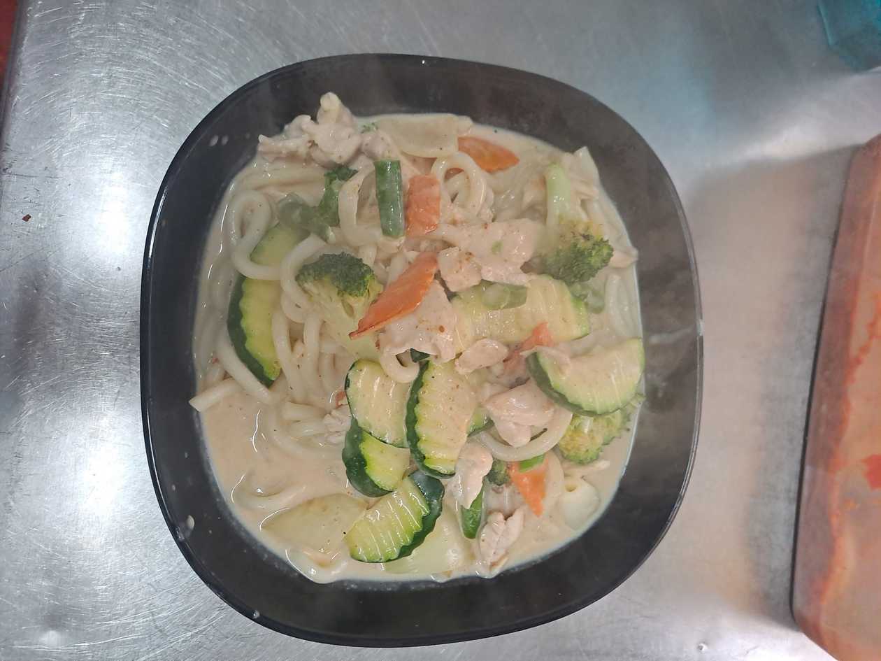 Udon noodle with peanuts sauce.