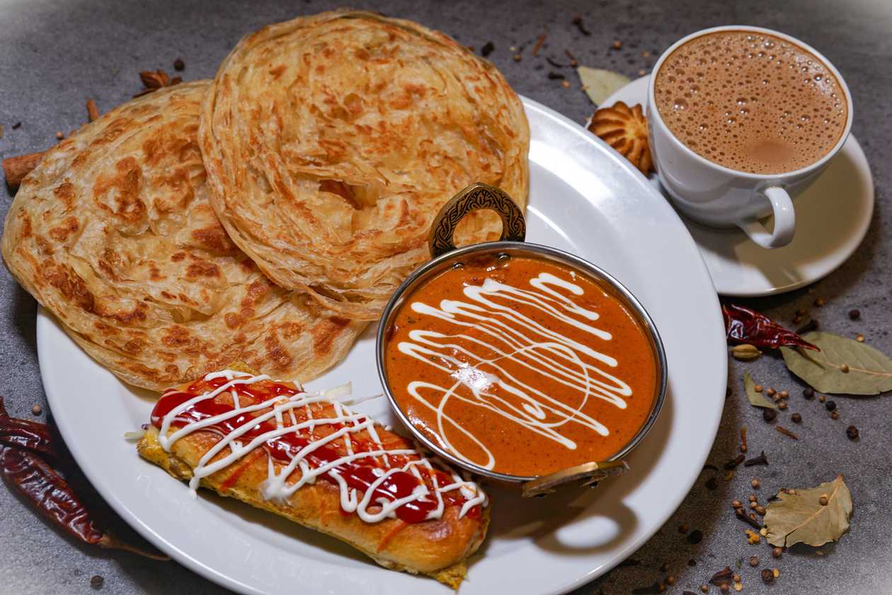 Tandoori Butter Chicken with Roti John and Parotta