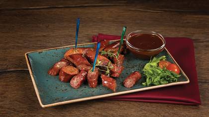 Sausage assorti from Spain with BBQ sauce