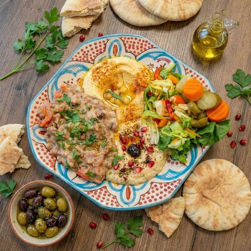 Fava beans , plate, hummus, pita menu