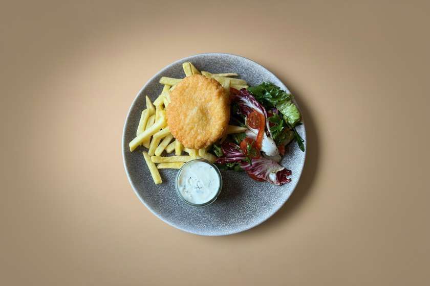 Crispy cheese schnitzel with fries and fresh salad