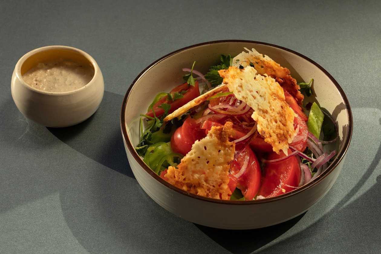 Tomato And Cucumber Salad With Hazelnut Sauce & Cheese Crisps