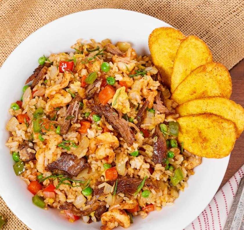 Vegetables rice with fried plantain