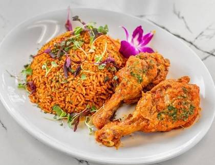 Jollof rice with chicken drumsticks