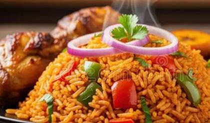 Vegetables Jollof rice with fried chicken and plantains