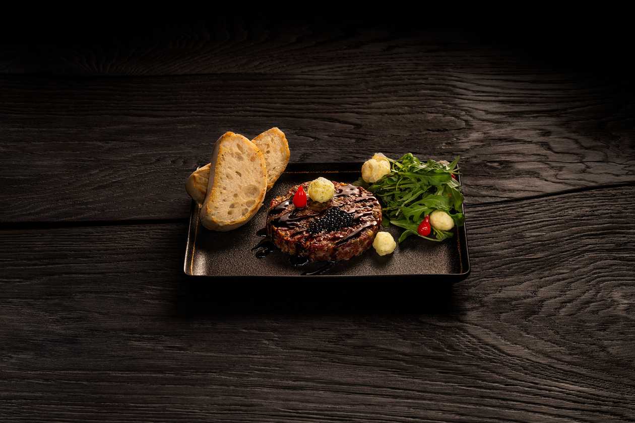 Tatar Beef with Balsamic Vinegar Caviar, Dried Grated Truffle Flavored "Džiugas" Cheese