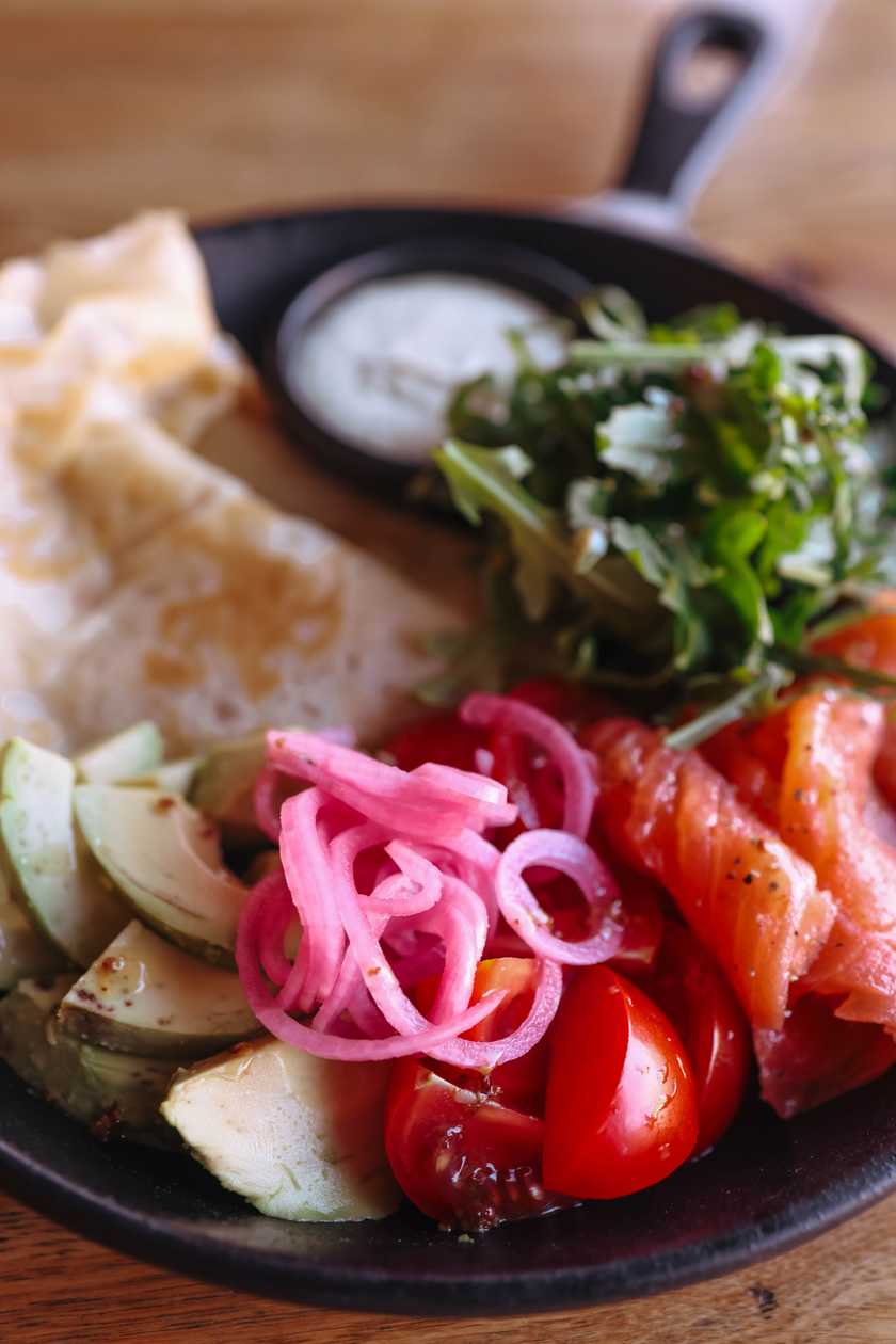 Pancake with lightly salted salmon and avocado