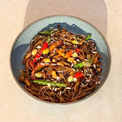 Noodles with vegetables and tofu in teriyaki sauce