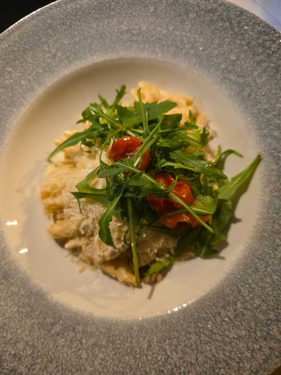 Creamy pasta with pulled chicken meat