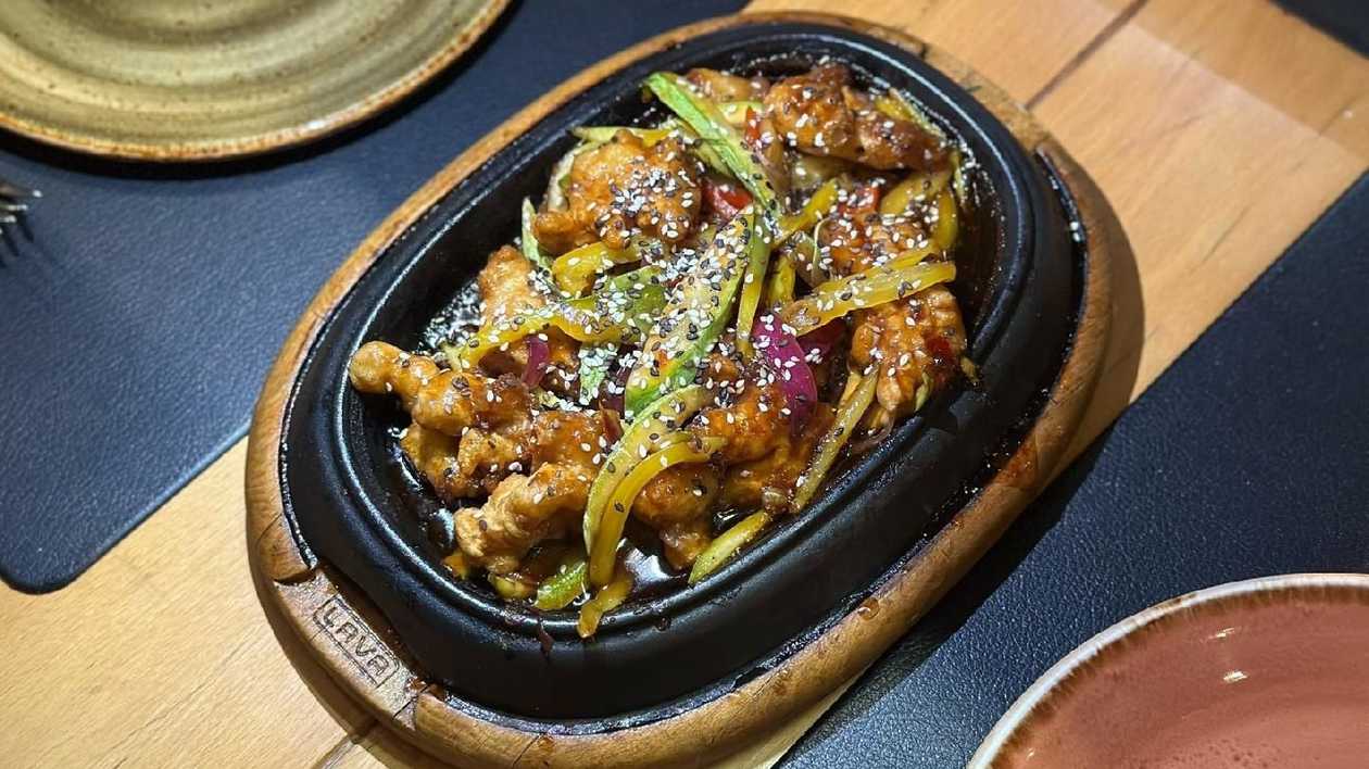 Hot Frying Pan with Beef & Vegetables in Asian Sauce