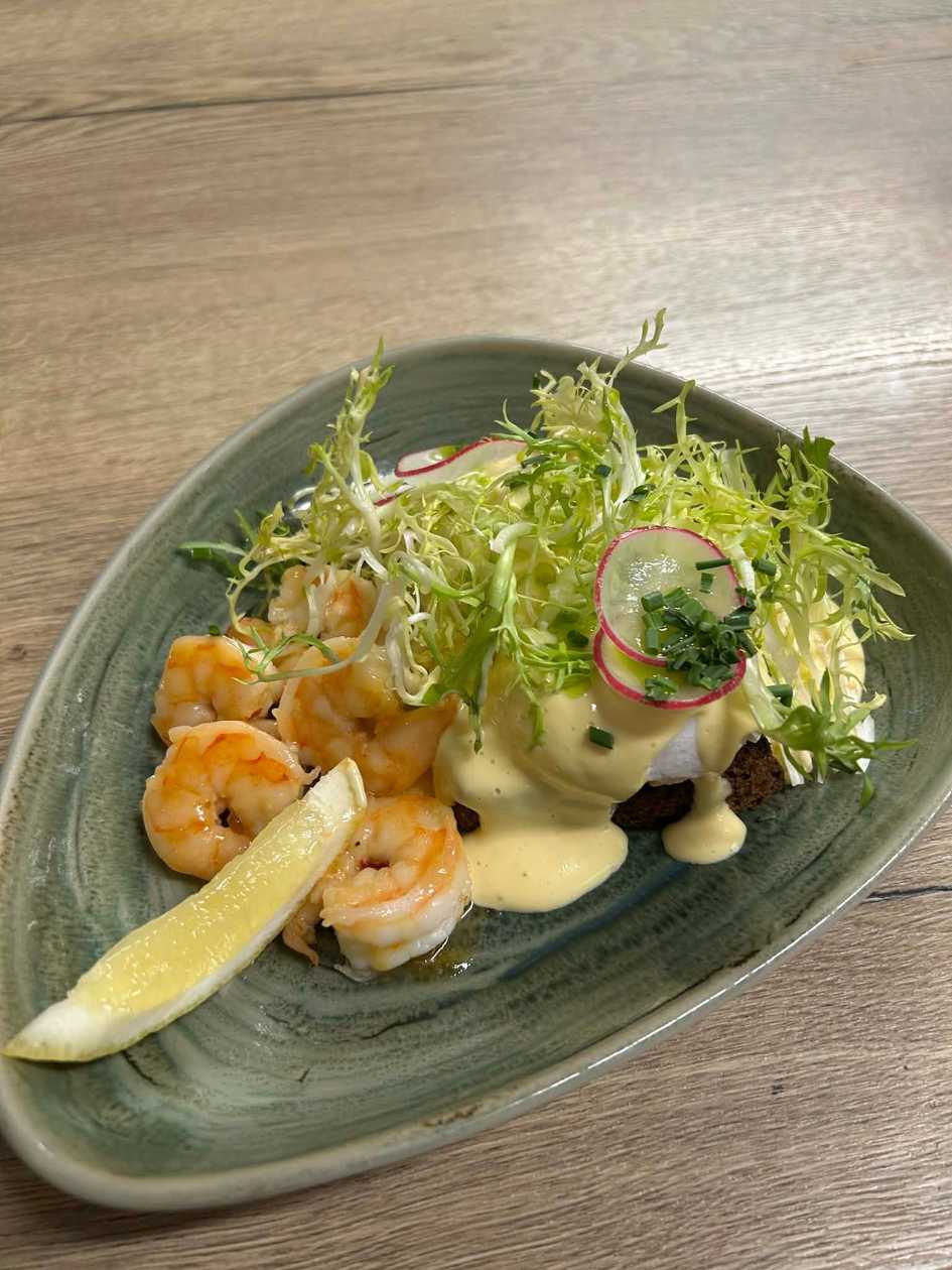 Eggs Benedict with Tiger Prawns