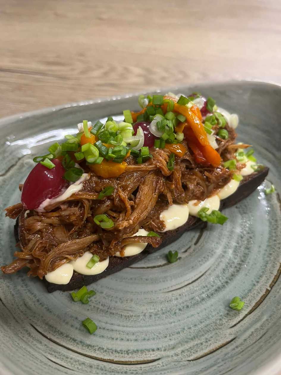 Pulled BBQ pork on rye bread