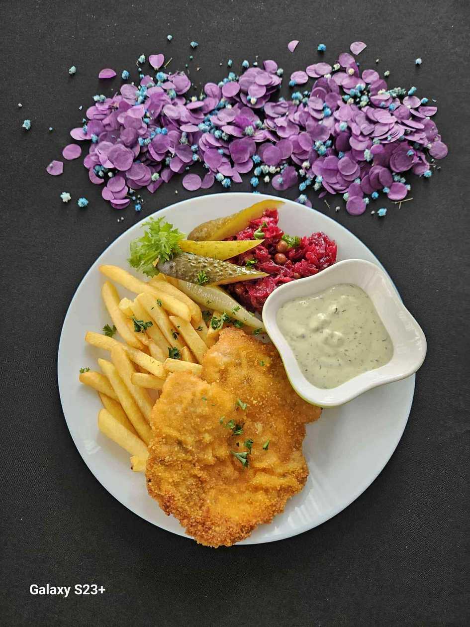 Pork Chop served with French Fries and Vegetables