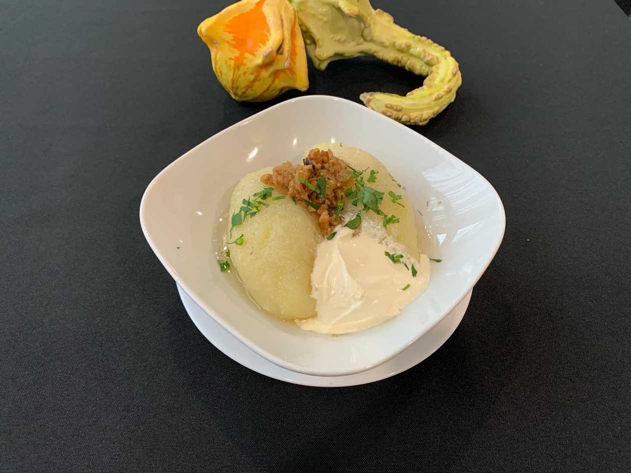 Cepelinai with Meat, Bacon Bits, and Sour Cream (3 pcs)