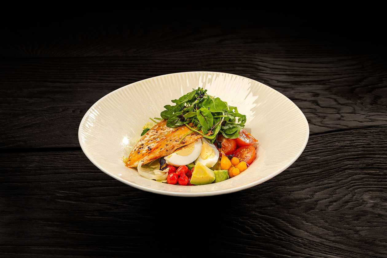 Fresh vegetable salad with sweet and sour citrus dressing