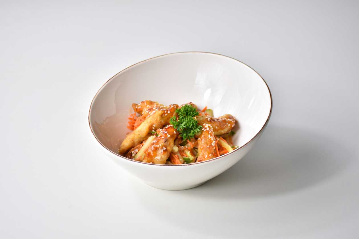 Chinese salad with fried pork tenderloin