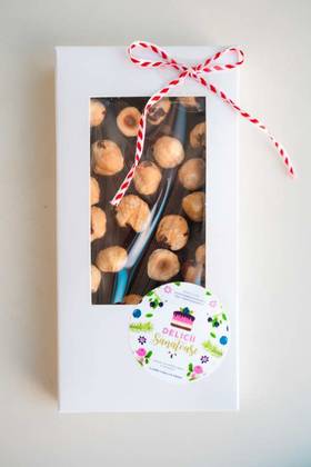 Tabletă de ciocolată cu alune de pădure 96 g