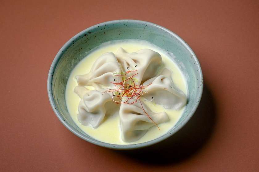 Mini Khinkali with Meat in Cheese Sauce