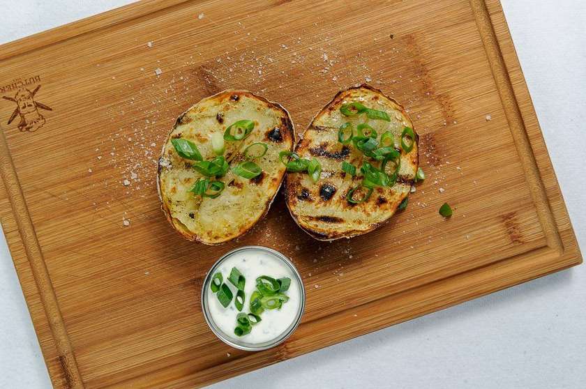 Baked Potato with Clarified Butter and Sour Cream with Chives
