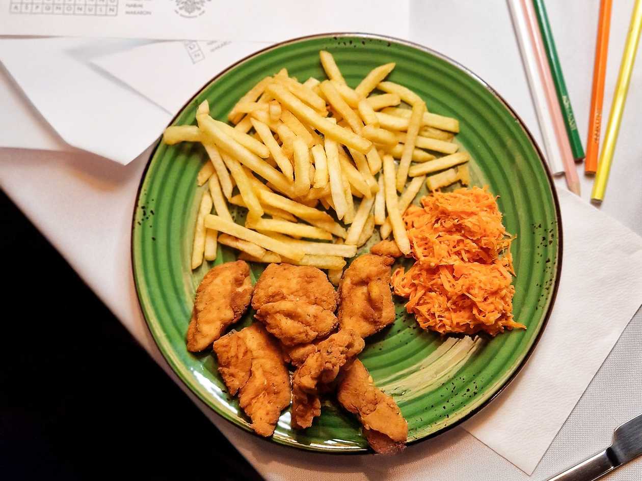Nuggets with french fries and Carrot Salad