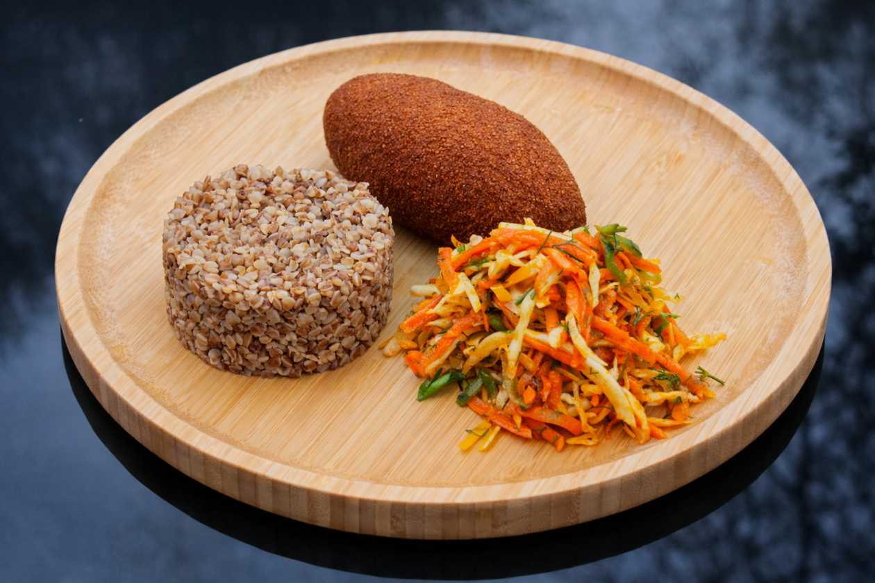 Kiev cutlet with garlic garnish