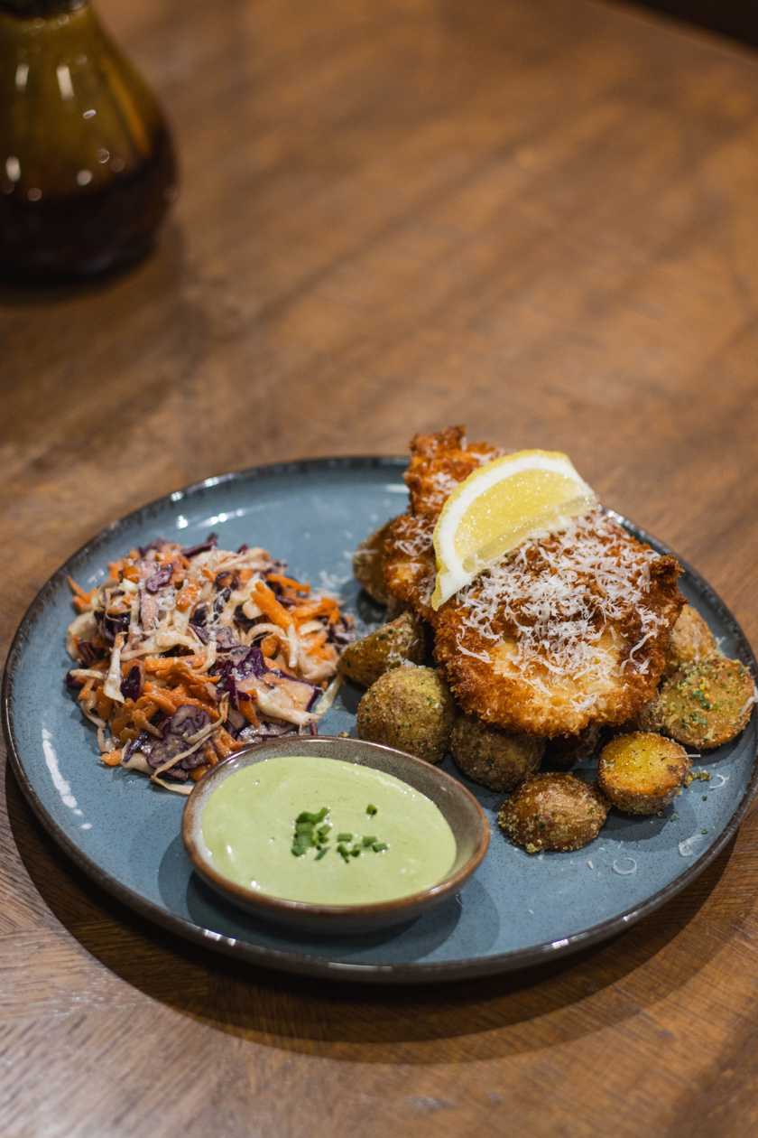 Chicken Schnitzel with Herb Potatoes and Peanut Coleslaw