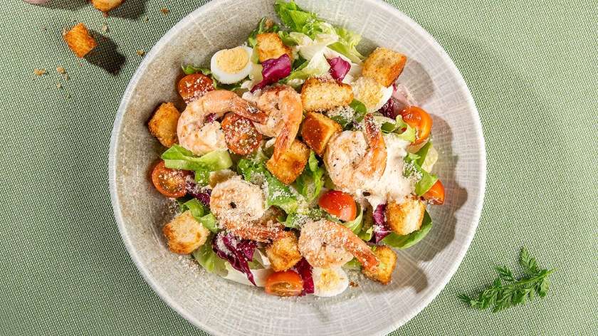 Lithuanian Caesar salad with prawns