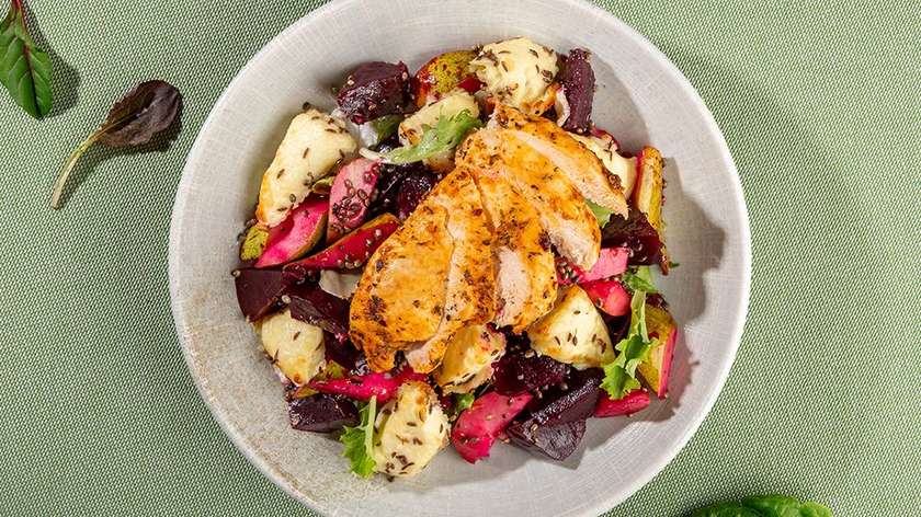 Lithuanian baked curd cheese, beet salad, and chicken