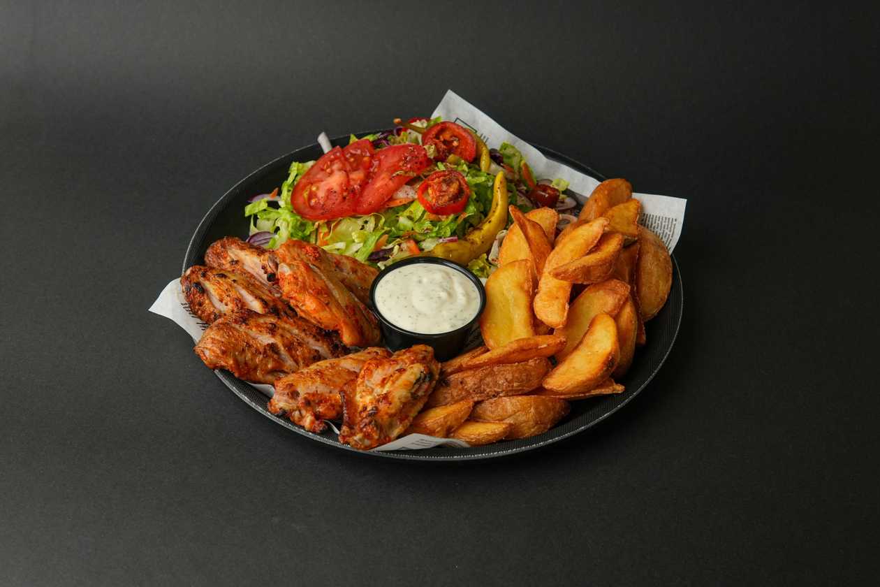 Chicken wings on plate