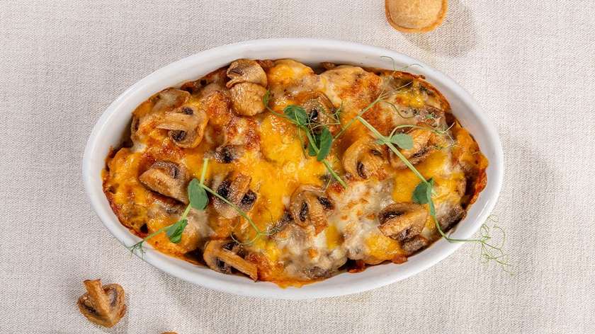 Fried pork dumplings with mushroom sauce