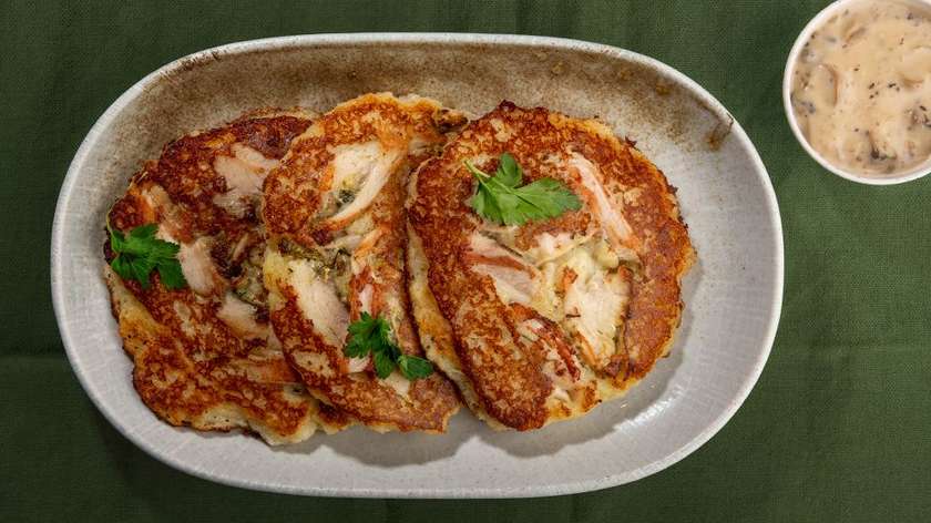 Potato pancakes fried with chicken