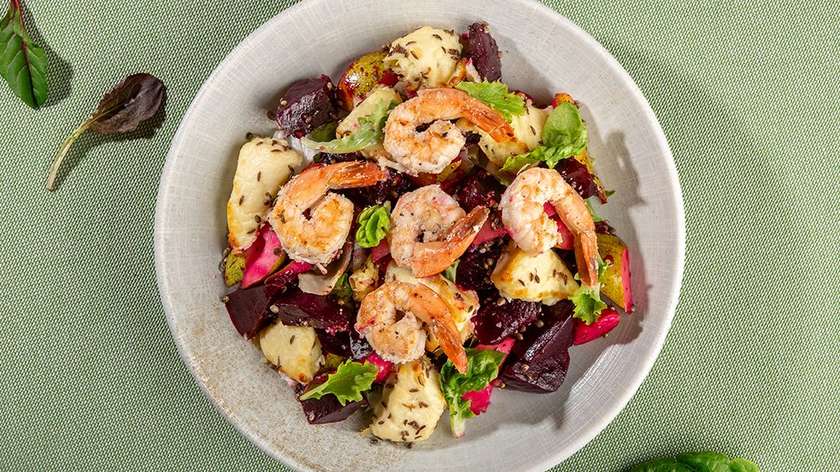Lithuanian baked curd cheese, beet salad, and prawns