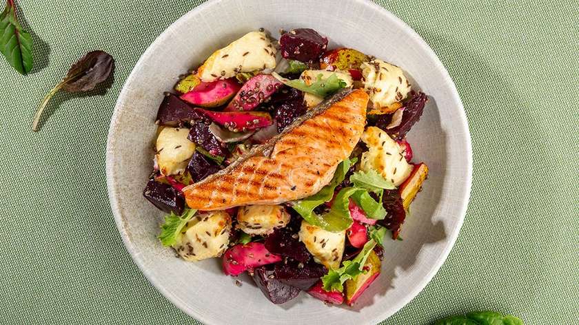 Lithuanian baked curd cheese, beet salad, and salmon