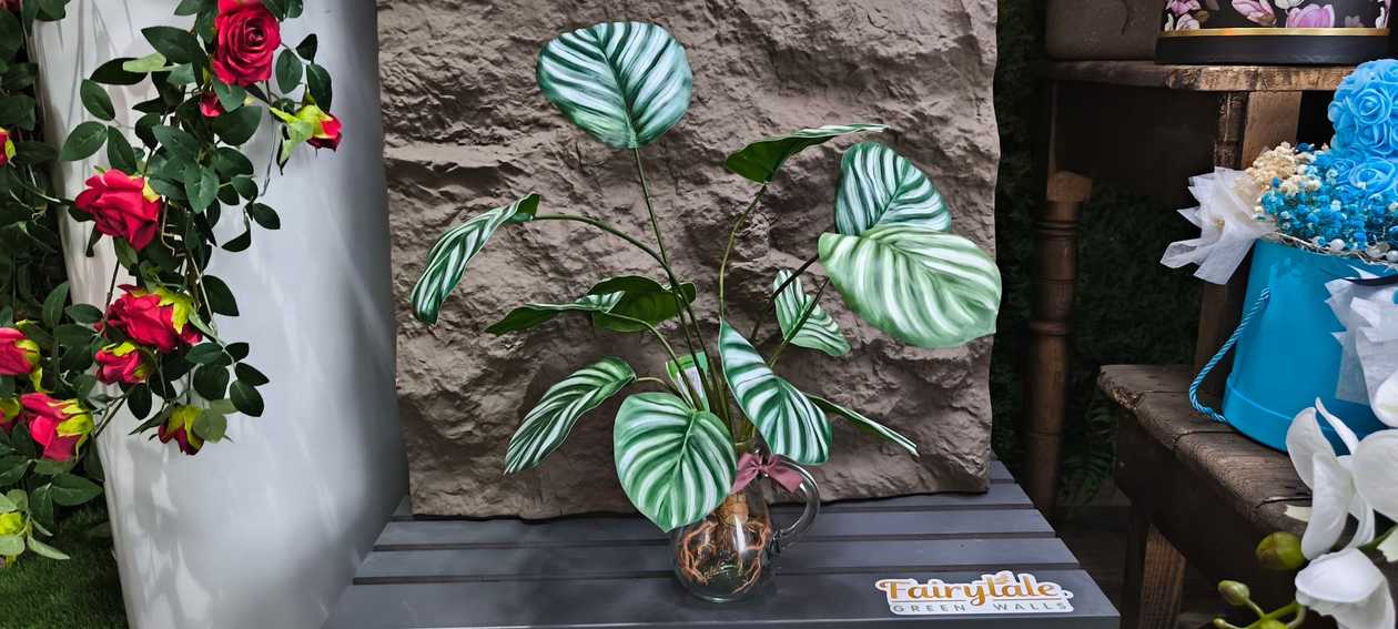 ARTIFICIAL ROOT CALATHEA ORBIFOLIA 61 CM IN TO GLASS POT