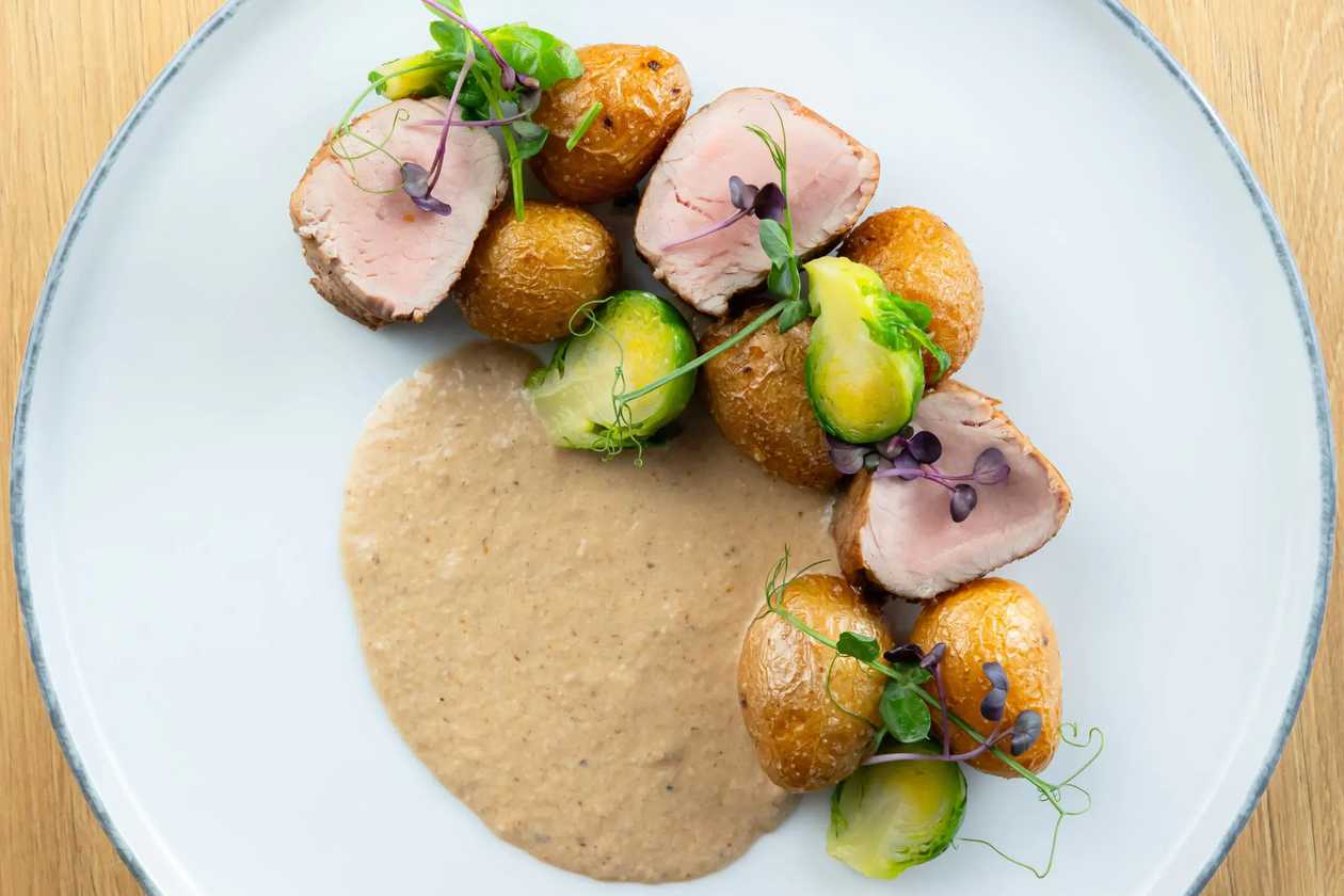 Sous-vide Pork Tenderloin, Creamy Mushroom Sauce, Baby Kale, Roasted Baby Potatoes Gluten-Free