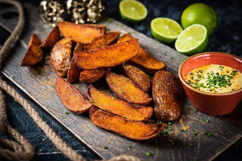 Mexican style potatoes with cheese sauce