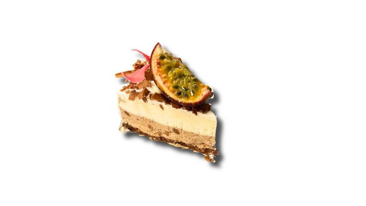 Slice of cocoa cookie and cream cheese cake