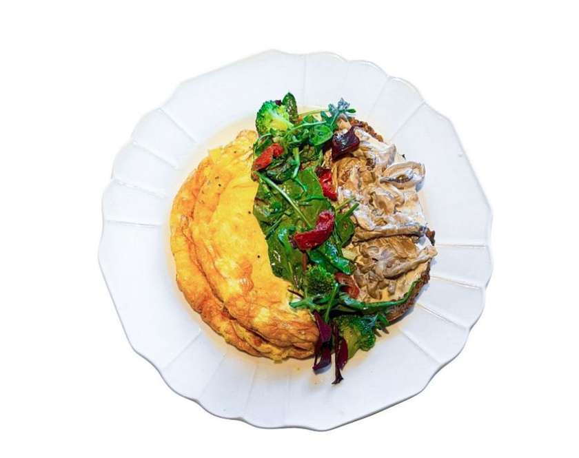 Omelette with Brie, Broccoli, and Mushroom Sauce