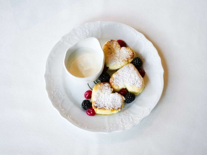 Children's Syrniki with Seasonal Berries and Sour Cream