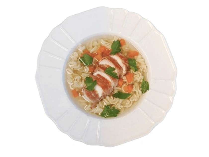 Chicken Broth in a Wooden Bowl