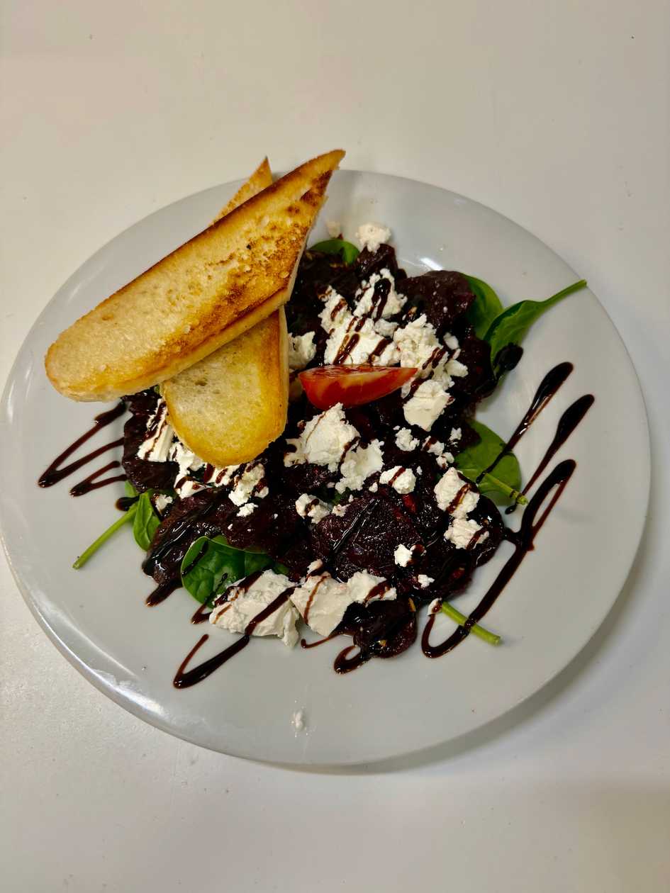 Greek salad with feta cheese, sun-dried tomatoes