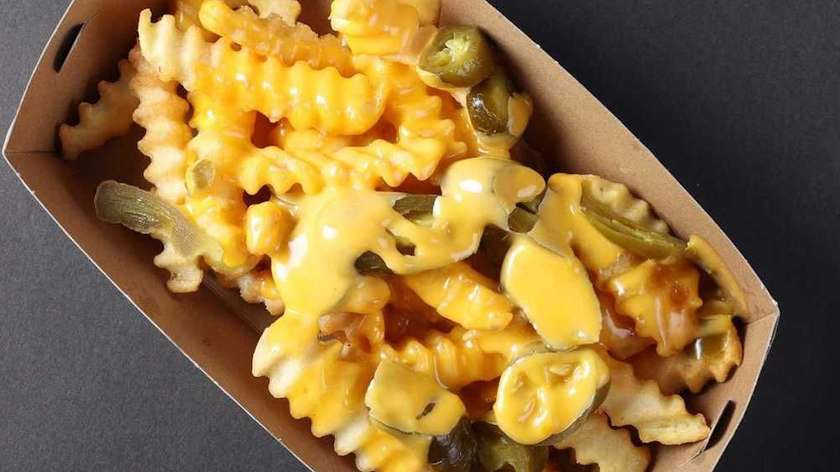 Fries with cheese sauce and jalapeños.