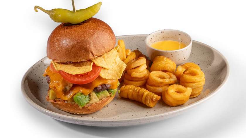 Mexican burger with fries
