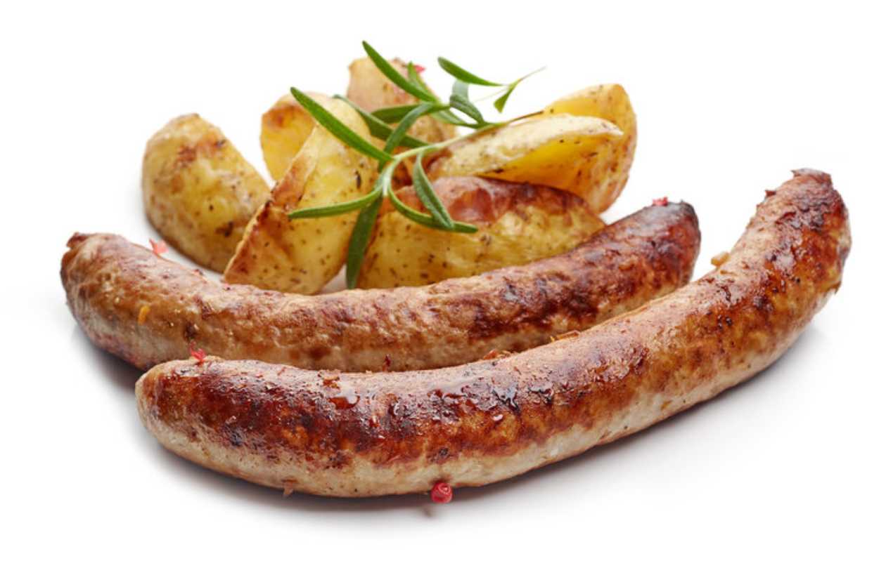 Homemade sausages with fries with garlic and greens