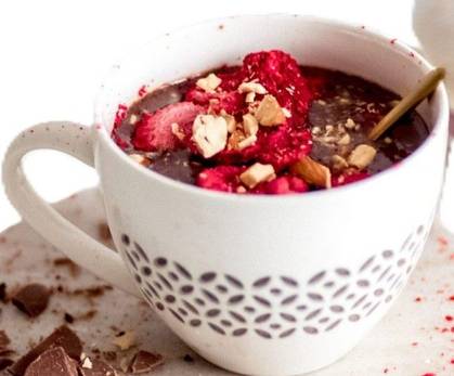 Hot chocolate with forest berries and cream (homemade)