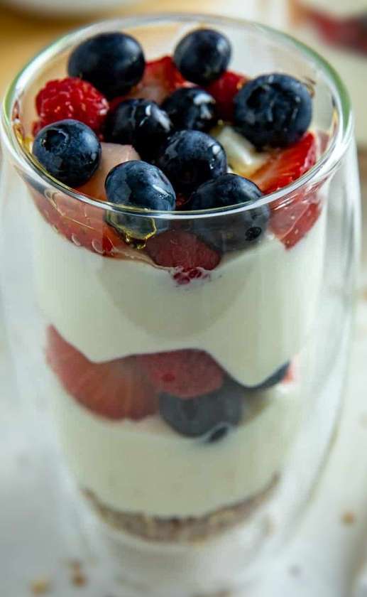 Yogurt cup with wild berries and muesli