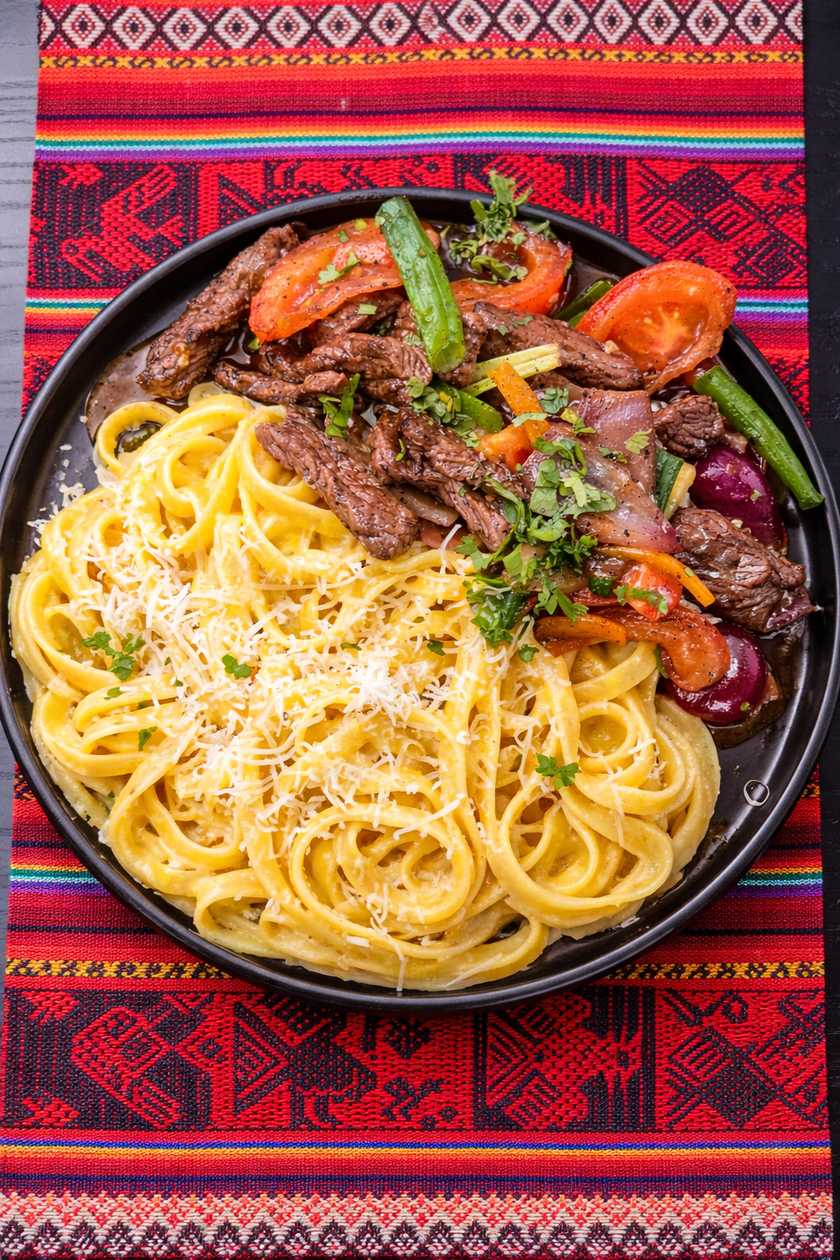 Fettuccine Huancaína with Lomo Saltado