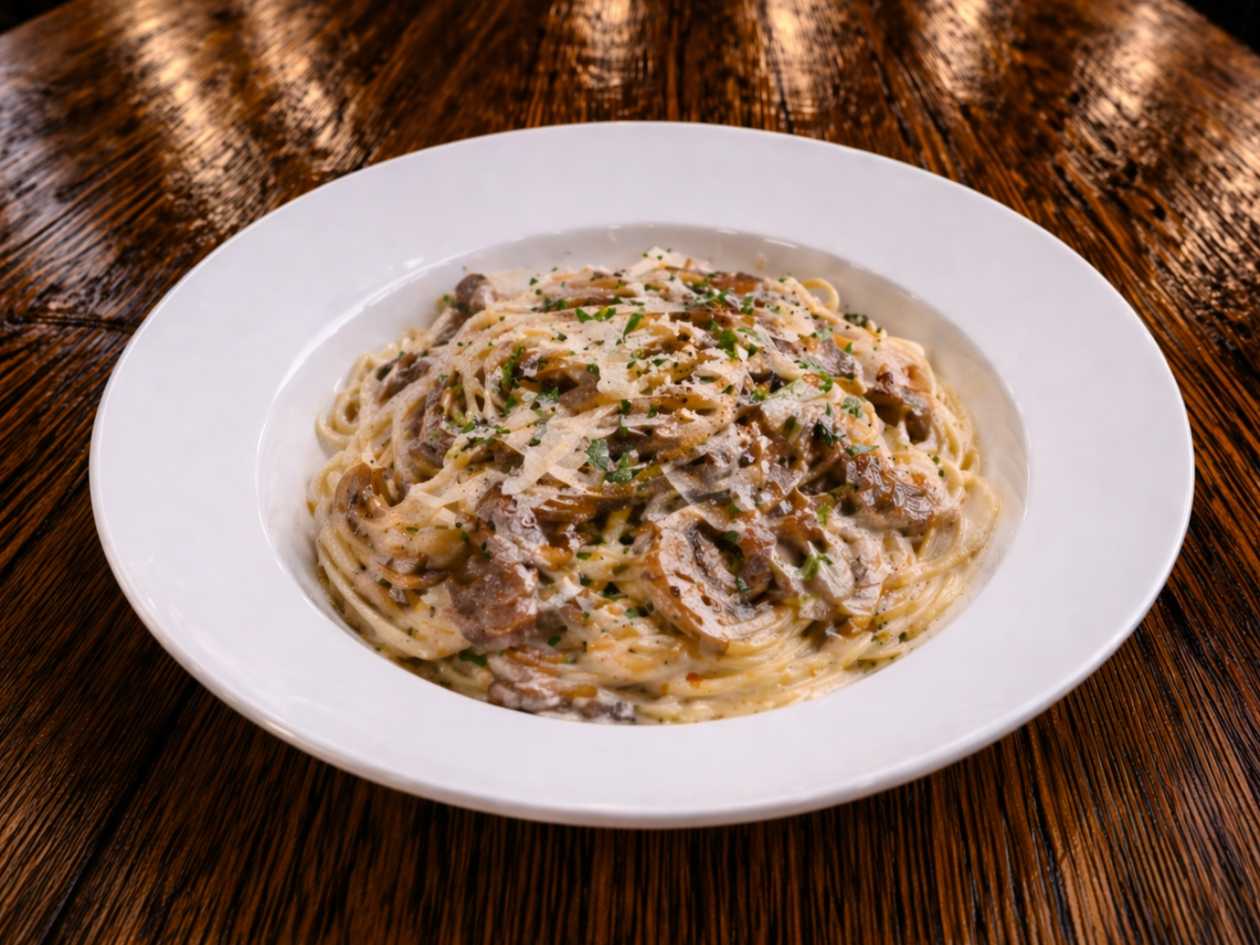 52. Linguine di vitello e funghi