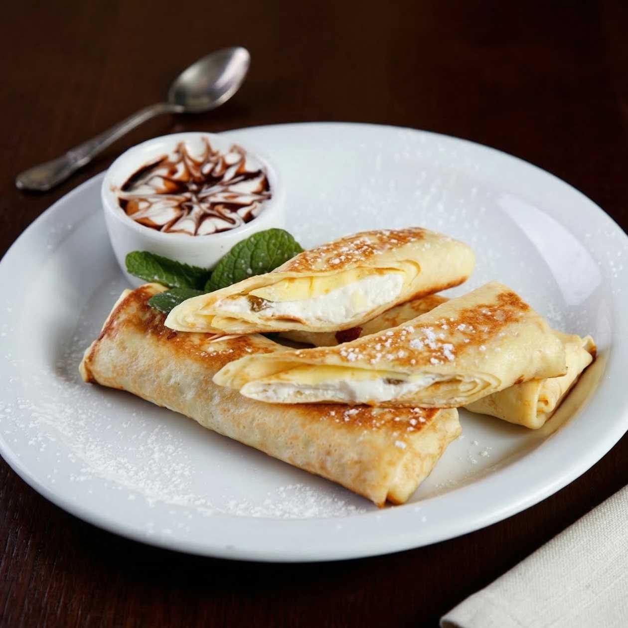 Pancakes with Sweet Cheese and Raisins